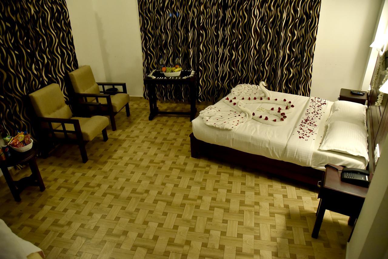 Natura Inn Munnar Bagian luar foto
