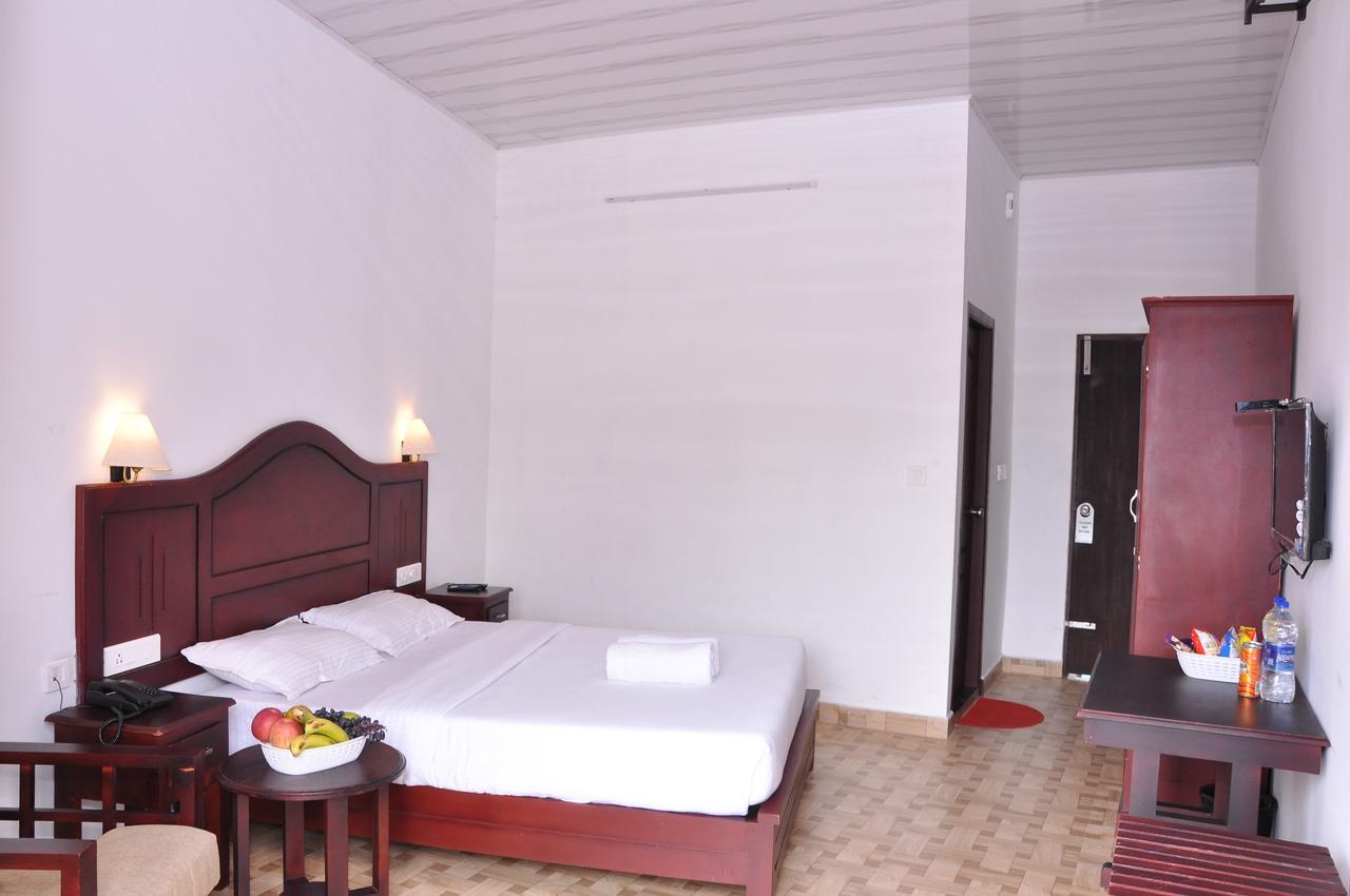 Natura Inn Munnar Bagian luar foto